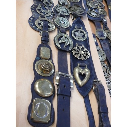 383 - Box of 20 martingale and display straps with mostly older horse brasses, 19th century and early 20th... 