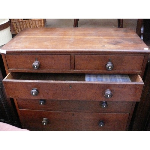 411 - An early 19th Century oak chest of drawers - two over three, with turned rosewood knobs