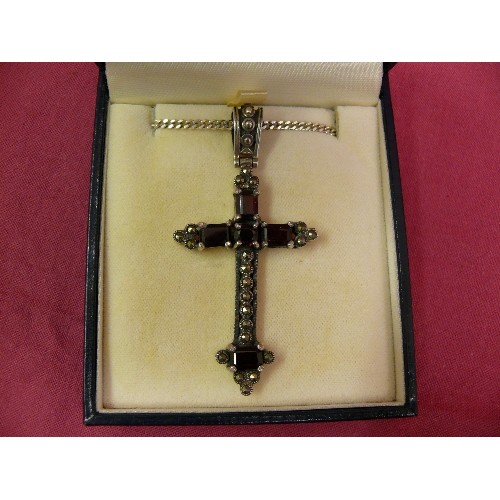 31 - A BEAUTIFUL SILVER & DEEP RED GARNET CROSS ON 18