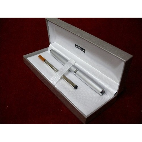 10 - AN INOXCROM PEN IN PRESENTATION BOX WITH REFILL.