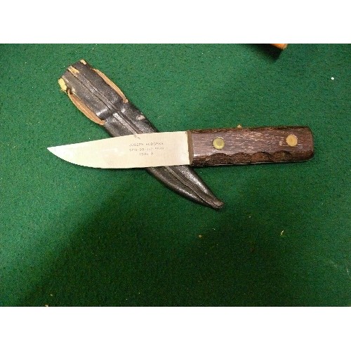 50 - A BRITISH MILITARY SERVICE KNIFE IN SCABBARD.