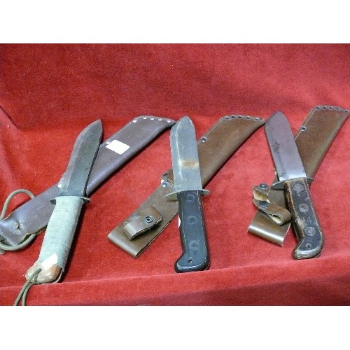 54 - THREE BRITISH MILITARY ALL PURPOSE / SURVIVAL KNIVES WITH SHEATHS CROWS FEET.