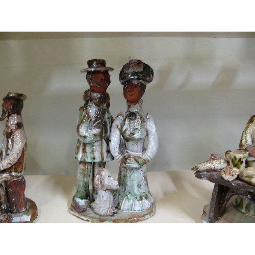 64 - THREE VARIOUS FIGURINES OF PEOPLE, HANDMADE BY SEVEN SPRINGS POTTERY.