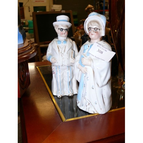 308 - PAIR OF CERAMIC NODDING HEAD FIGURINES, GENTLEMAN HAS BEEN REPAIRED.