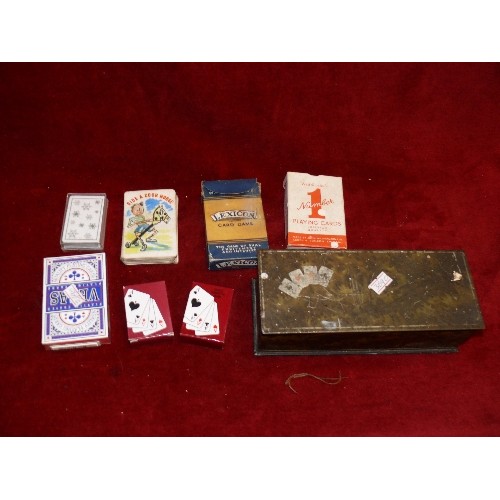 64 - VINTAGE PLAYING CARD THEMED BISCUIT TIN WITH CONTENTS OF VARIOUS PACKS OF PLAYING CARDS.