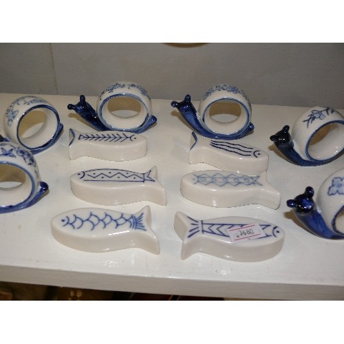 102 - DECORATIVE CERAMIC BLUE AND WHITE TABLEWEAR WITH FISH AND SNAILS.