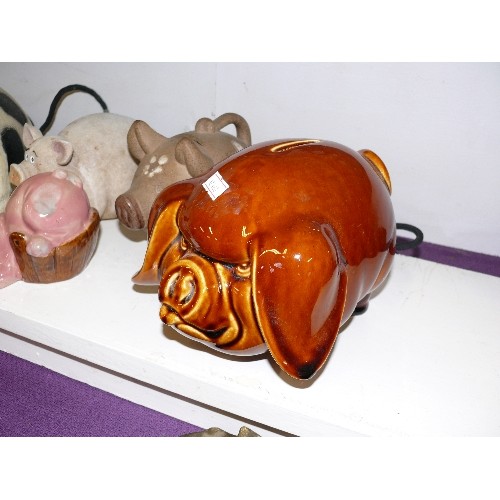 105 - SIX LARGE PIG ORNAMENTS / MONEY BOXES.