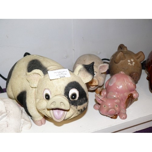 105 - SIX LARGE PIG ORNAMENTS / MONEY BOXES.