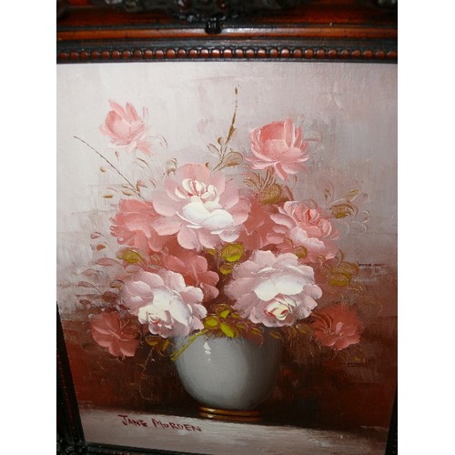 153 - OIL PAINTING OF A VASE OF FLOWERS IN AN ORNATE FRAME SIGNED BY JANE MORDEN.