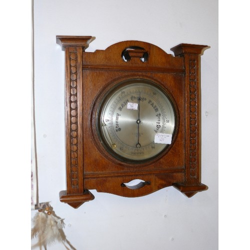 127 - ART DECO WOODEN FRAMED ANEROID BAROMETER.