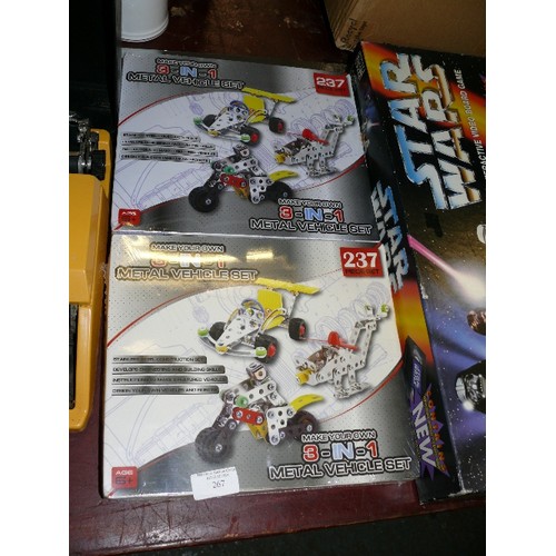 267 - TWO NEW UNOPENED MAKE YOUR OWN 3 IN 1 METAL VEHICLE SETS.