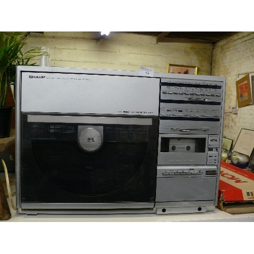 290 - SHARP BOTH SIDES PLAY DISC STEREO SYSTEM  VZ-3400E.