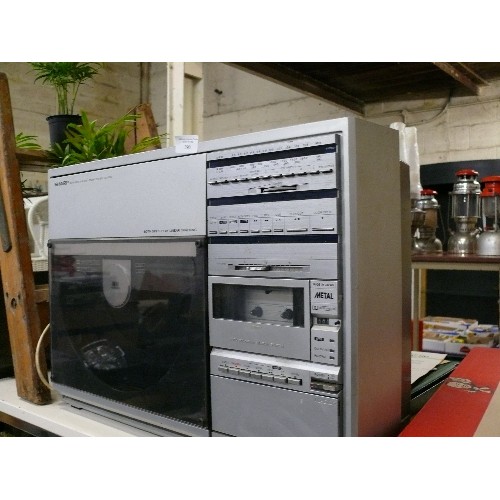 290 - SHARP BOTH SIDES PLAY DISC STEREO SYSTEM  VZ-3400E.