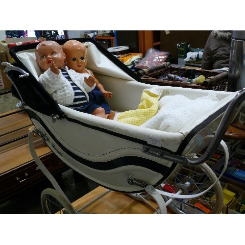 315 - LARGE COACHBUILT PRAM WITH TWO VINTAGE DOLLS.