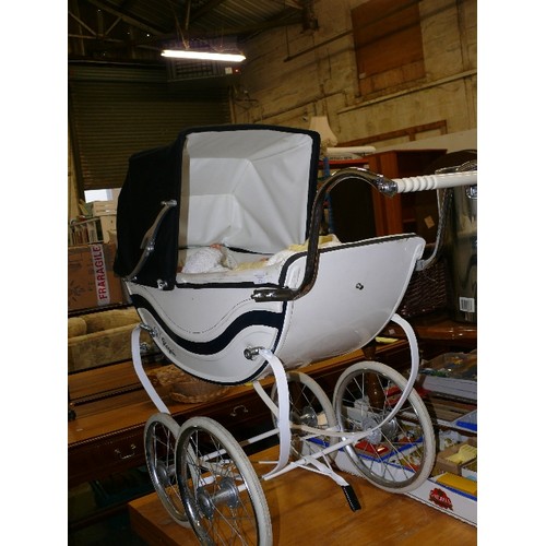 315 - LARGE COACHBUILT PRAM WITH TWO VINTAGE DOLLS.