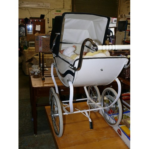 315 - LARGE COACHBUILT PRAM WITH TWO VINTAGE DOLLS.