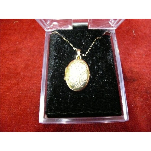 12 - A 9CT GOLD LOCKET AND CHAIN WEIGHT 2.21GR.