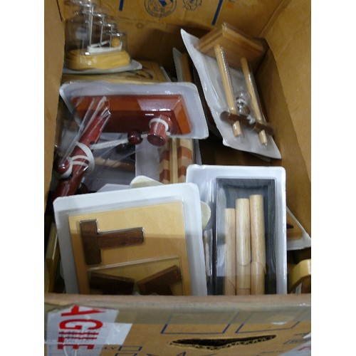 251 - BOX OF TWENTY VARIOUS WOODEN PUZZLES.