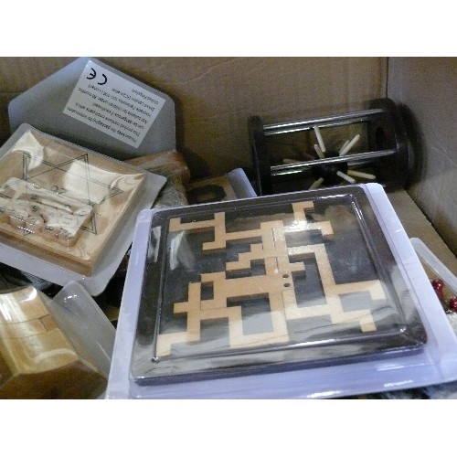 253 - BOX OF TWENTY-SEVEN VARIOUS WOODEN PUZZLES.