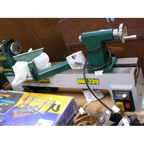 256 - A RECORD POWER DML320 WOOD TURNING LATHE.