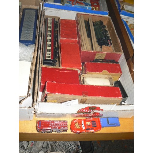 324 - MIXED COLLECTORS BOX OF TRAINS, CARRIAGES AND TRUCKS BY HORNBY AND TRIX TWIN.