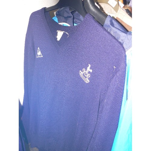 261 - THREE TOTTENHAM HOTSPUR JUMPERS AND TWO POLO SHIRTS SIZE L/XL PLUS A BRAND NEW JACKET XL.