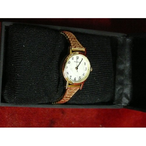 30 - A LOVELY UNWORN SEKONDA GOLD PLATED LADIES WATCH IN OWN BOX.