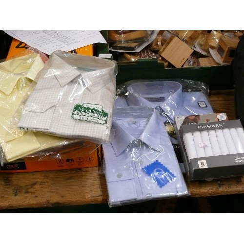 369 - FOUR NEW PACKAGED SHIRTS, A BOX OF PANTS AND A BOX OF HANDKERCHIEFS.