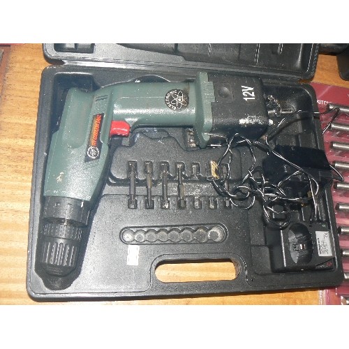 392 - CASED 12V DRILL WITH BATTERY AND CHARGER PLUS A FUTHER CASE WITH AN HITACHI DRILL AND A TORCH.