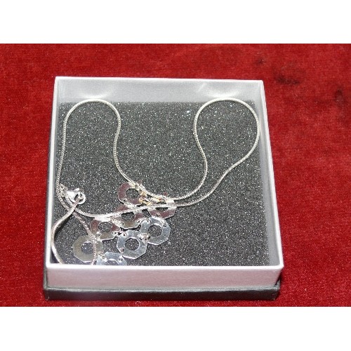 8 - MODERN STYLE NECKLACE WITH EIGHT OCTAGONAL LINKED PENDANTS ON A SILVER CHAIN.