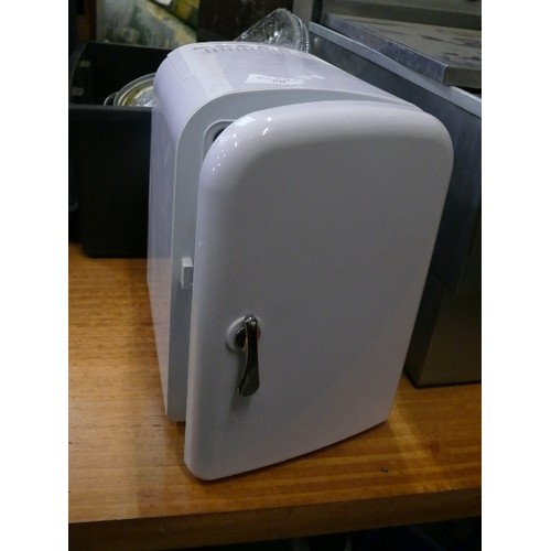 396 - MINI PORTABLE FRIDGE, ALSO HAS WARM MODE.