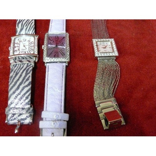 11A - FOUR DIAMANTE FACED LADIES WATCHES - PAULA FRANCHI, TWO DMQ AND MARCEL.