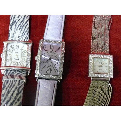 11A - FOUR DIAMANTE FACED LADIES WATCHES - PAULA FRANCHI, TWO DMQ AND MARCEL.