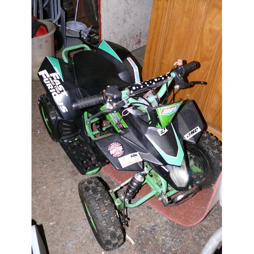 464 - A CHILD'S PETROL DRIVEN MINI QUAD BIKE, OFF ROAD USE ONLY.  REPORTEDLY WORKING.