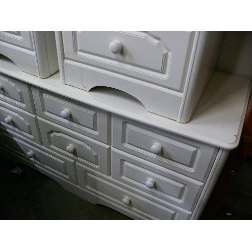 481 - A LARGE SIX OVER TWO CHEST OF DRAWERS PLUS A MATCHING PAIR OF THREE DRAWER BEDSIDE TABLES.