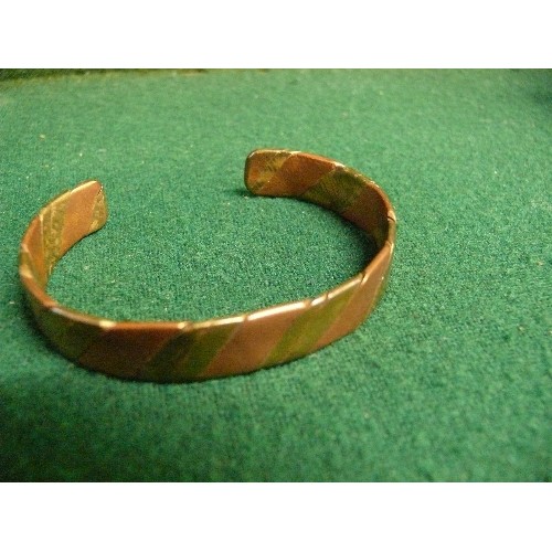 44 - TWISTED COPPER AND BRASS BANGLE.