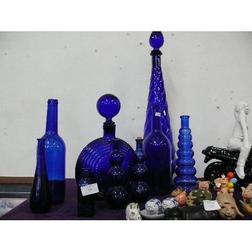 135 - LARGE COLLECTION OF LOVELY BLUE GLASS BOTTLES.