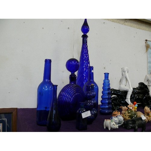 135 - LARGE COLLECTION OF LOVELY BLUE GLASS BOTTLES.