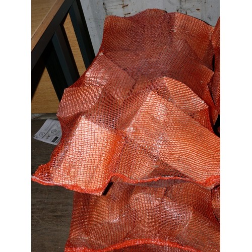 401C - TWO ORANGE NETS WOOD OFFCUTS LARGER.