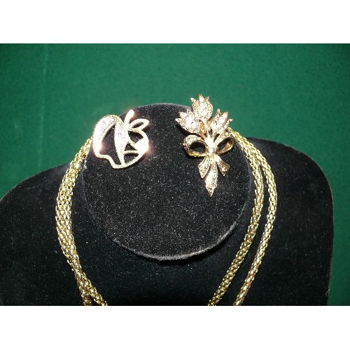 56 - TWO GOLD COLOURED ANGULAR NECKLACES, TWO GOLD COLOURED BROOCHES AND TWO SMALL JEWELLERY POUCHES