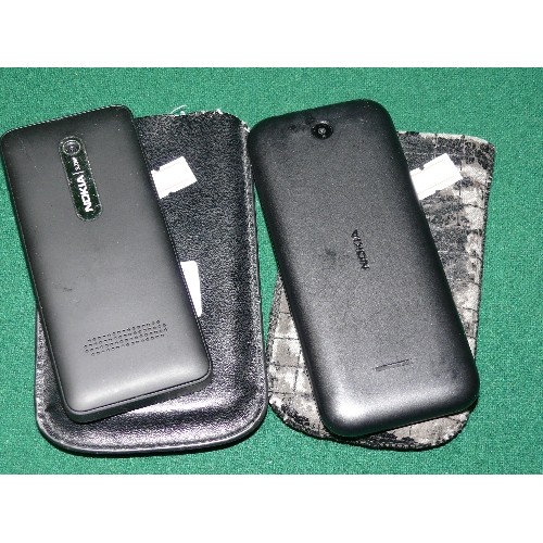 111 - TWO NOKIA MOBILE PHONES BOTH WITH CASES