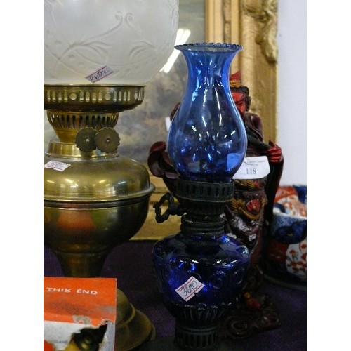 119 - A BRASS OIL LAMP WITH GLASS SHADE AND CHIMNEY PLUS A FURTHER BLUE GLASS OIL LAMP AND A BOXED ALADDIN... 