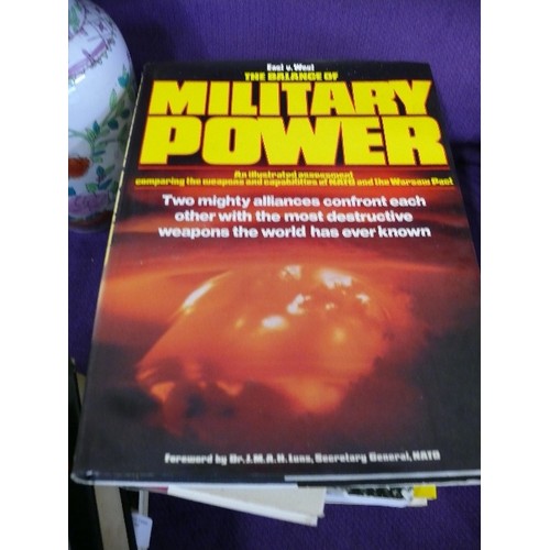 121 - A COLLECTION OF VARIOUS MILITARY THEMED BOOKS