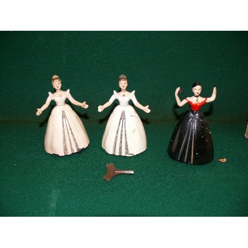 149 - THREE LOVELY VINTAGE MECHANICAL DANCING LADIES WITH  KEY - PROBABLY EARLY DISNEY PRINCESS FIGURES.