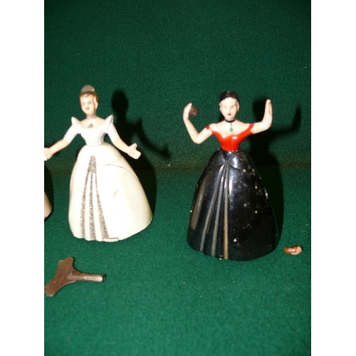 149 - THREE LOVELY VINTAGE MECHANICAL DANCING LADIES WITH  KEY - PROBABLY EARLY DISNEY PRINCESS FIGURES.