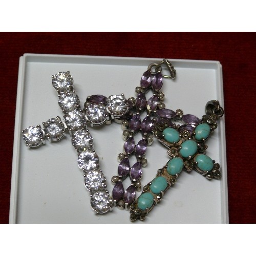 20 - THREE CROSS PENDANTS, ALL SET IN SILVER & MARKED 925, INCLUDING A TURQUOISE AND MARCASITE EXAMPLE.