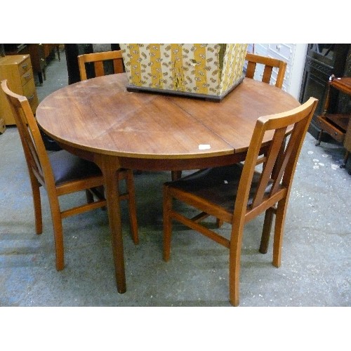 393 - TEAK MACKINTOSH OF KIRKCALDY EXTENDING TABLE AND FOUR CHAIRS.