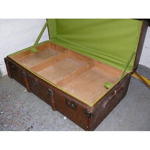 426 - STEAMER TRUNK, BANDED, WITH INTERNAL LINER AND TRAY, THE NAME NIGEL ALCOCK AND A VETERAN TIE AND  FL... 