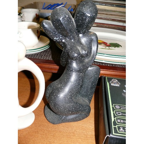 222 - TWO CONTEMPORARY FIGURES, ONE CREAM SOAPSTONE AND A BLACK MARBLE EFFECT COUPLE.