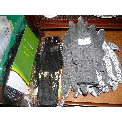 223 - SEVERAL PAIRS OF WORK GLOVES AND TWO PAIRS OF USB HEATED INSOLES.